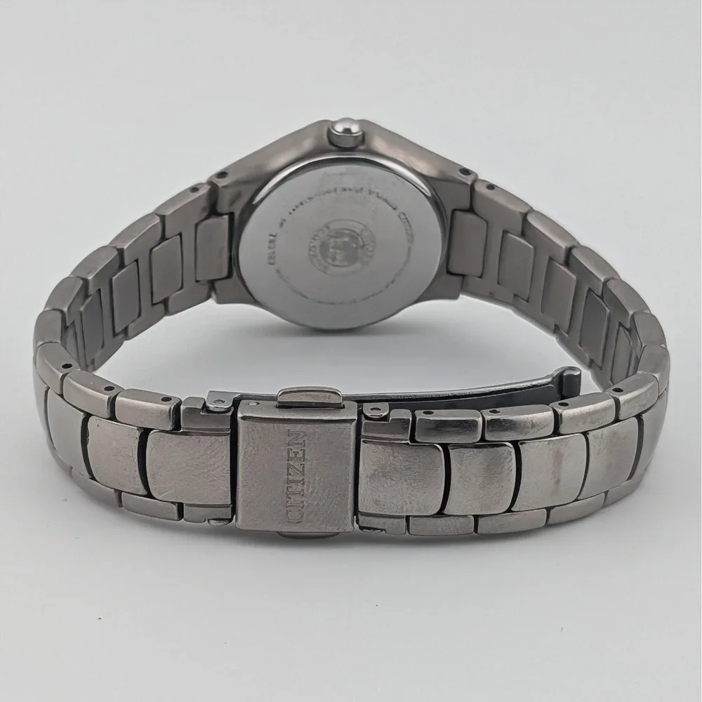Citizen Eco-Drive Titanium E001-K18451 Women's WR100 Day Date Black Dial Watch